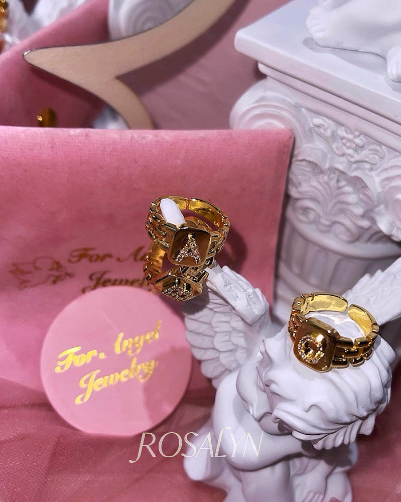 DIAMOND-ENCRUSTED LETTER RING