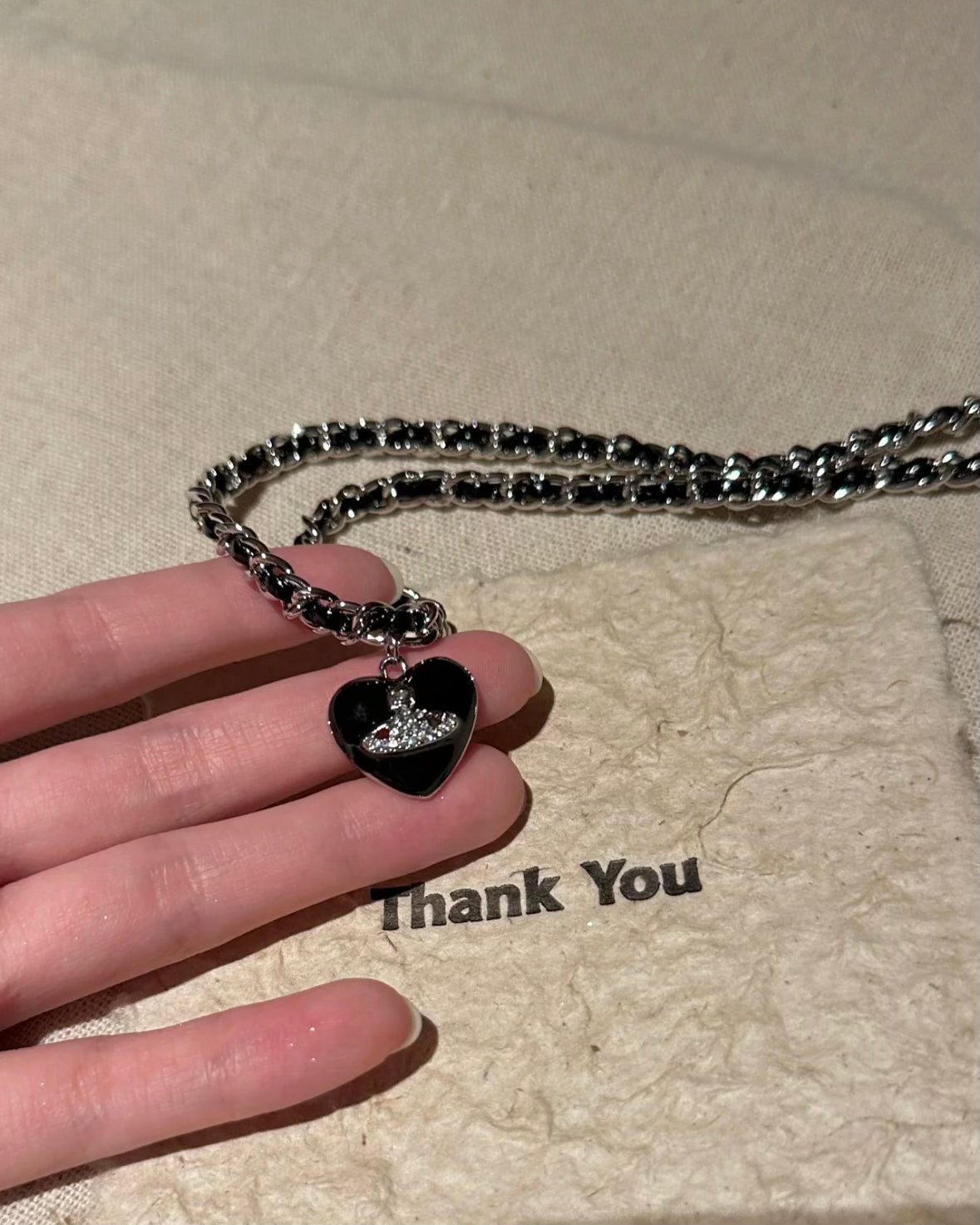 BLACK SATURN NECKLACE