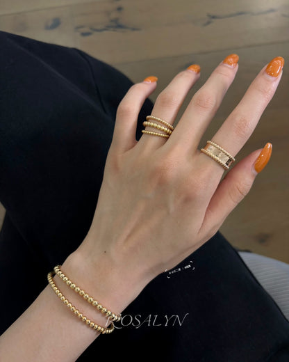 SIGNED RING AND BEAD RING