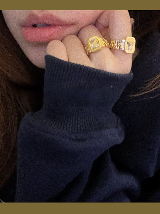 DIAMOND-ENCRUSTED LETTER RING