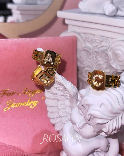 DIAMOND-ENCRUSTED LETTER RING