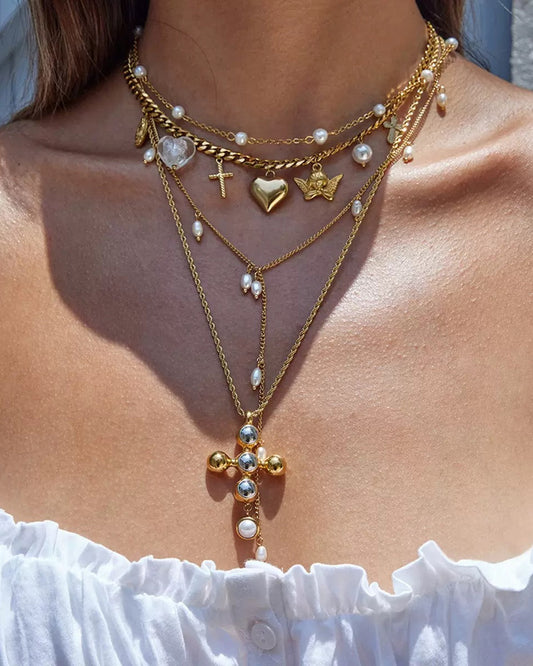 SACRED CROSS NECKLACE