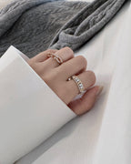 SIXTEEN-STONE RING