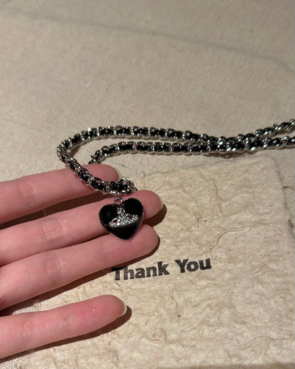 BLACK SATURN NECKLACE