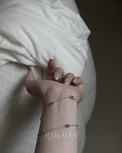 9 FLOWER TRIUMPHAL ARCH NECKLACE AND BRACELET